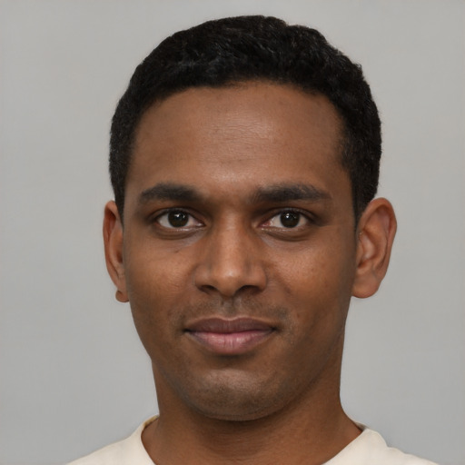 Neutral black young-adult male with short  black hair and brown eyes