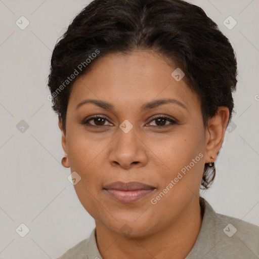 Joyful black adult female with short  brown hair and brown eyes