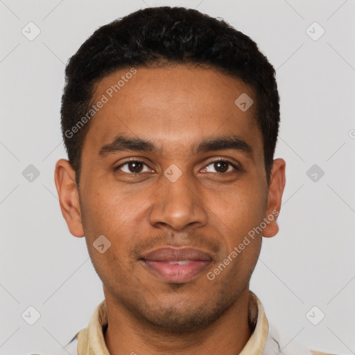 Joyful black young-adult male with short  brown hair and brown eyes