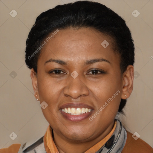 Joyful latino adult female with short  brown hair and brown eyes