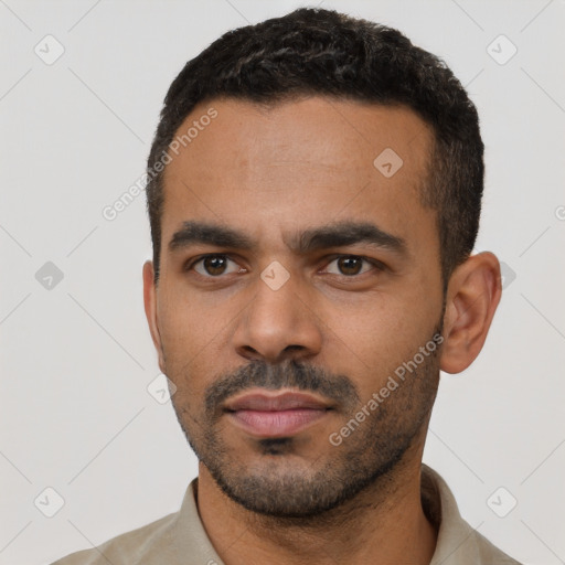 Neutral black young-adult male with short  black hair and brown eyes
