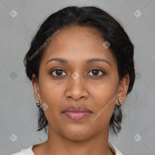 Joyful black young-adult female with medium  brown hair and brown eyes