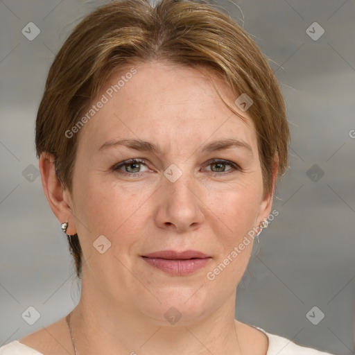 Joyful white adult female with medium  brown hair and grey eyes