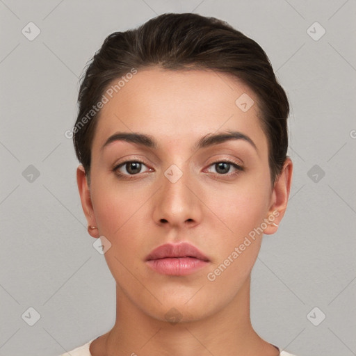 Neutral white young-adult female with short  brown hair and brown eyes