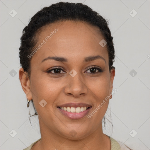 Joyful black young-adult female with short  brown hair and brown eyes