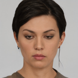 Neutral white young-adult female with short  brown hair and brown eyes