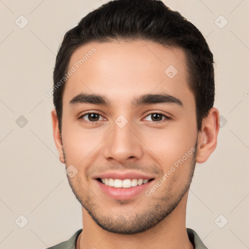 Joyful white young-adult male with short  black hair and brown eyes