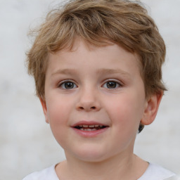 Joyful white child male with short  brown hair and brown eyes