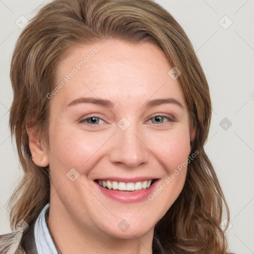 Joyful white young-adult female with medium  brown hair and blue eyes