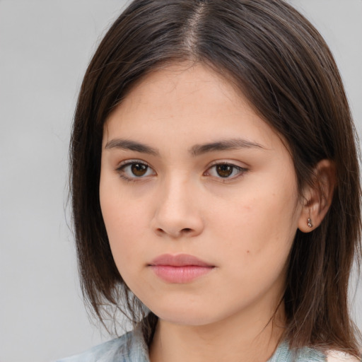 Neutral white young-adult female with medium  brown hair and brown eyes