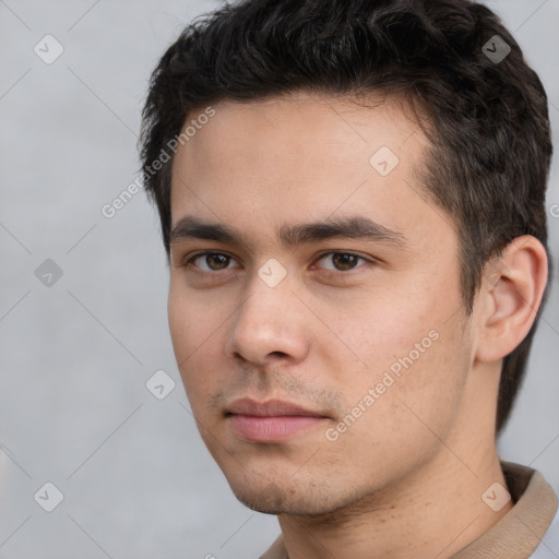 Neutral white young-adult male with short  black hair and brown eyes