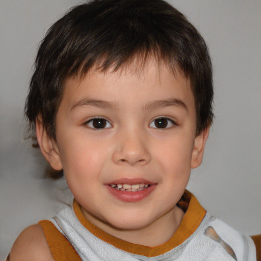 Joyful white child male with short  brown hair and brown eyes