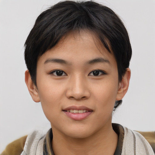 Joyful asian young-adult female with short  brown hair and brown eyes