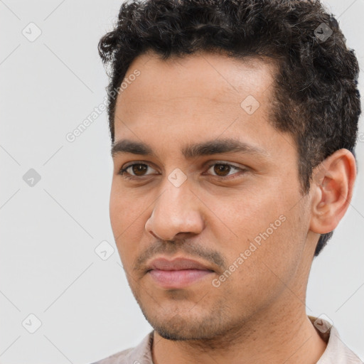 Neutral white young-adult male with short  black hair and brown eyes