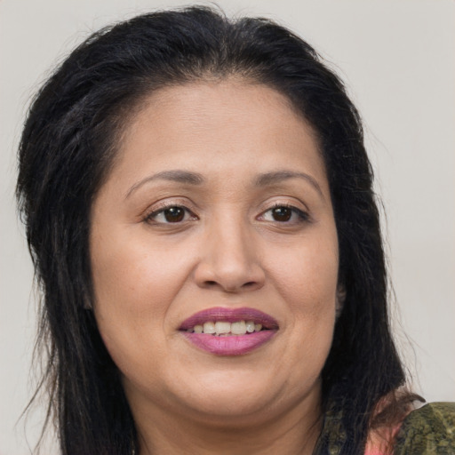 Joyful asian adult female with medium  brown hair and brown eyes