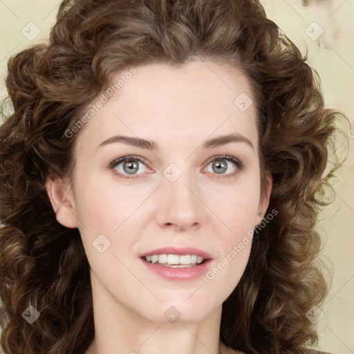 Joyful white young-adult female with long  brown hair and green eyes