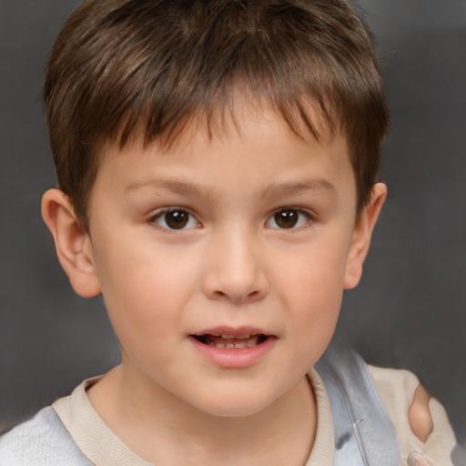 Joyful white child male with short  brown hair and brown eyes
