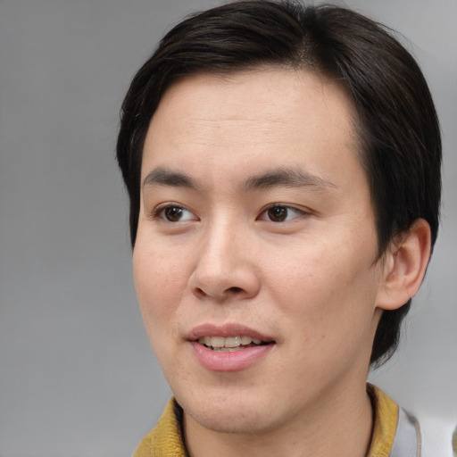 Joyful white young-adult male with medium  brown hair and brown eyes