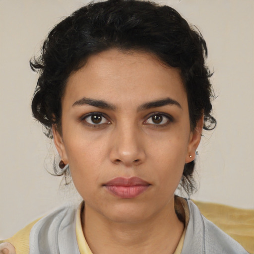 Neutral latino young-adult female with medium  black hair and brown eyes