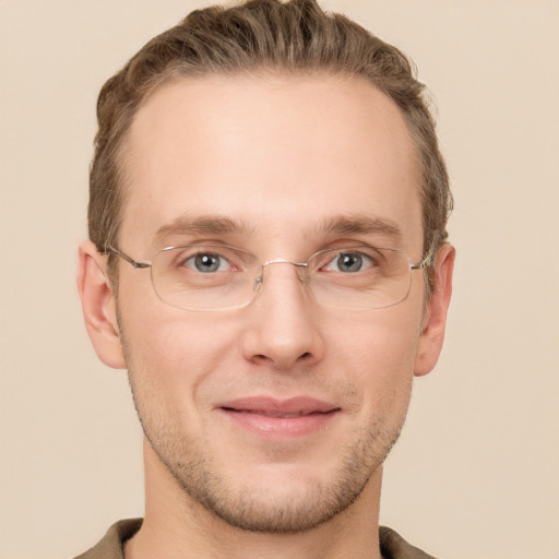 Joyful white adult male with short  brown hair and grey eyes