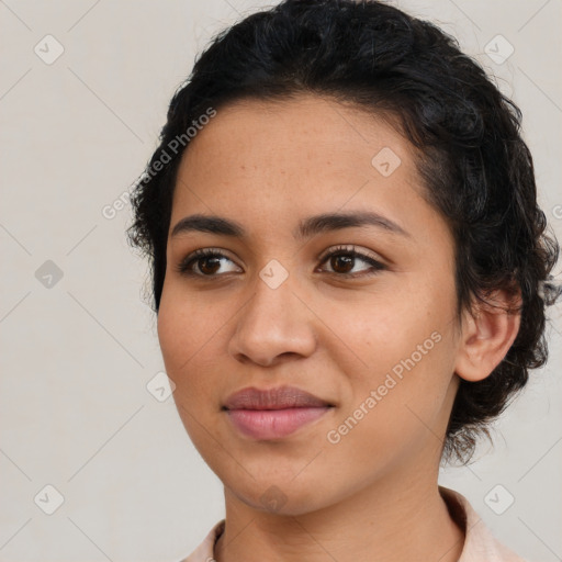 Joyful latino young-adult female with medium  black hair and brown eyes