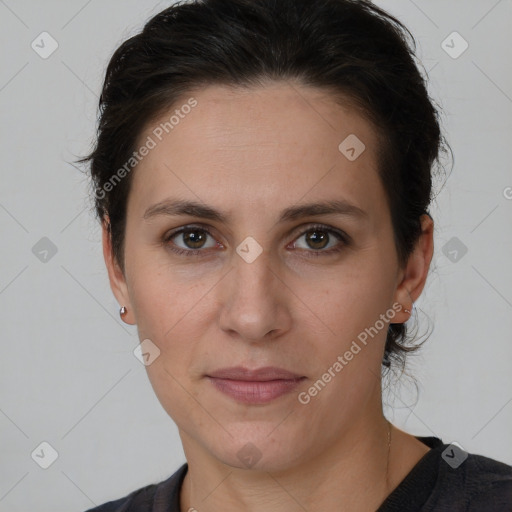 Joyful white adult female with short  brown hair and brown eyes