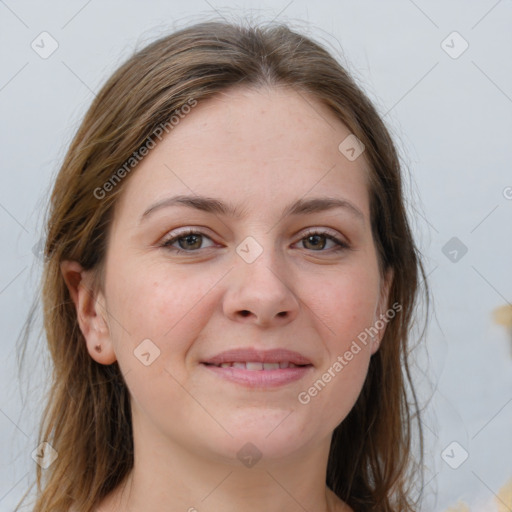 Joyful white young-adult female with medium  brown hair and grey eyes