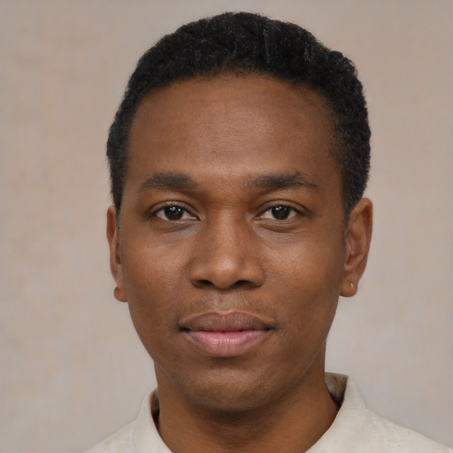 Neutral black young-adult male with short  black hair and brown eyes
