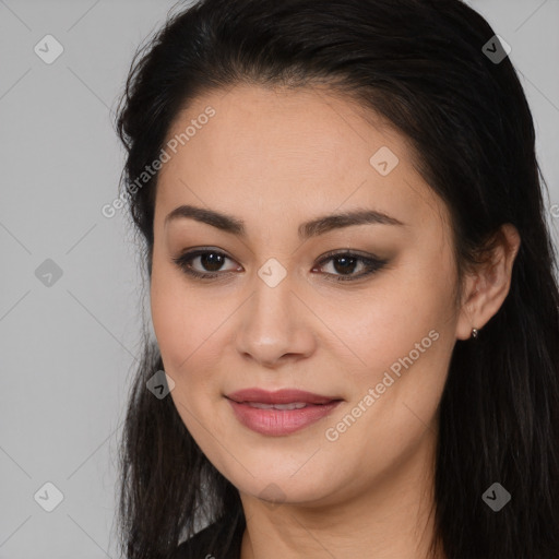 Joyful latino young-adult female with long  brown hair and brown eyes