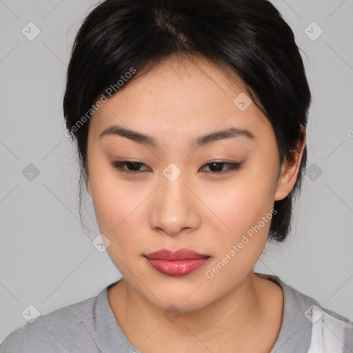 Neutral asian young-adult female with medium  brown hair and brown eyes