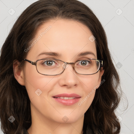 Joyful white young-adult female with medium  brown hair and green eyes