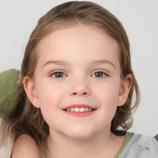 Joyful white child female with medium  brown hair and blue eyes