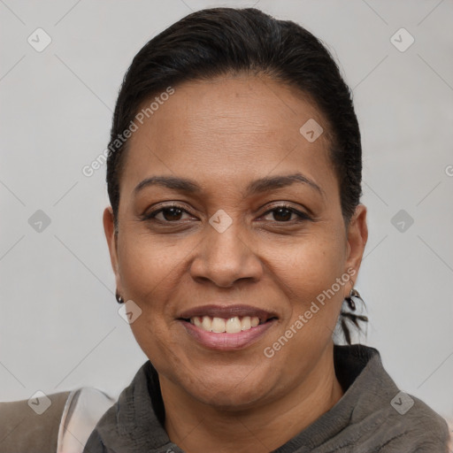 Joyful white adult female with short  brown hair and brown eyes