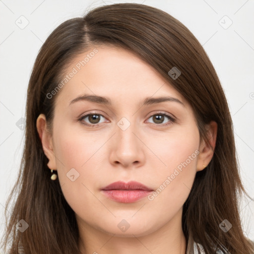 Neutral white young-adult female with long  brown hair and brown eyes