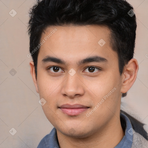 Joyful white young-adult male with short  black hair and brown eyes