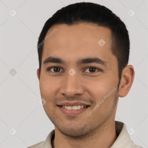 Joyful latino young-adult male with short  black hair and brown eyes