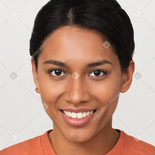 Joyful latino young-adult female with short  brown hair and brown eyes