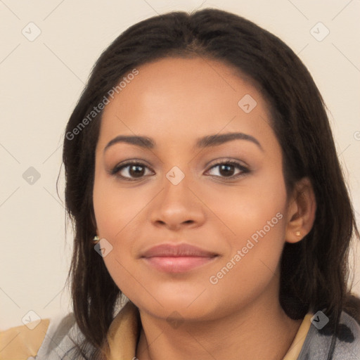 Joyful latino young-adult female with long  brown hair and brown eyes