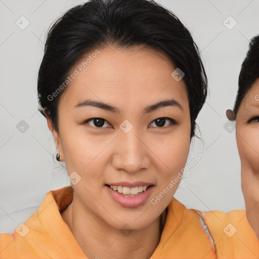 Joyful asian young-adult female with short  brown hair and brown eyes