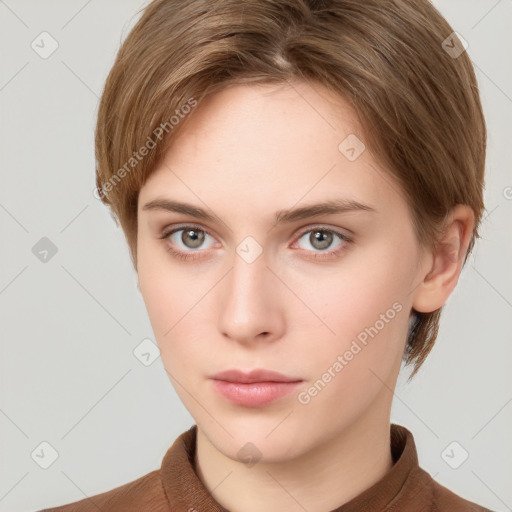 Neutral white young-adult female with short  brown hair and grey eyes