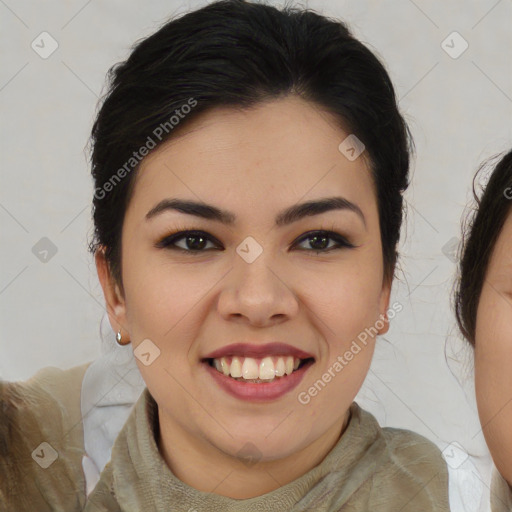 Joyful asian young-adult female with medium  brown hair and brown eyes