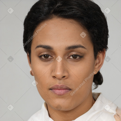 Neutral latino young-adult female with short  black hair and brown eyes