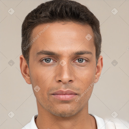 Neutral white young-adult male with short  brown hair and brown eyes