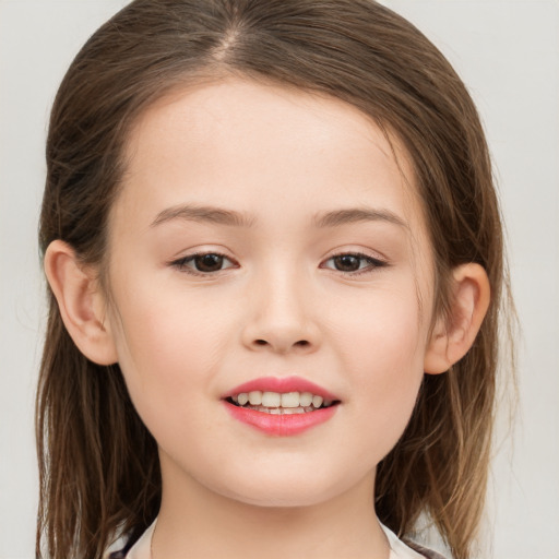 Joyful white child female with medium  brown hair and brown eyes