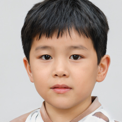 Neutral asian child male with short  brown hair and brown eyes