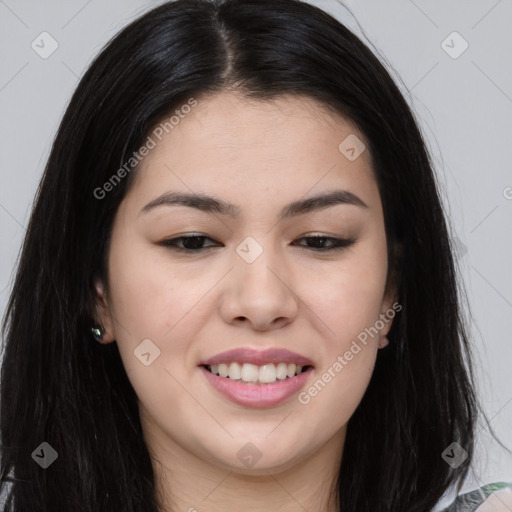 Joyful asian young-adult female with long  brown hair and brown eyes