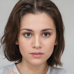 Neutral white young-adult female with medium  brown hair and brown eyes