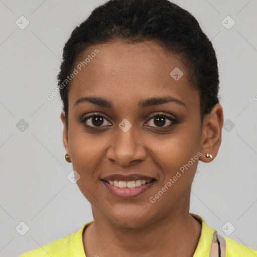 Joyful latino young-adult female with short  black hair and brown eyes