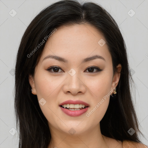 Joyful asian young-adult female with long  brown hair and brown eyes