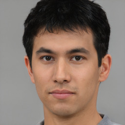 Neutral asian young-adult male with short  black hair and brown eyes